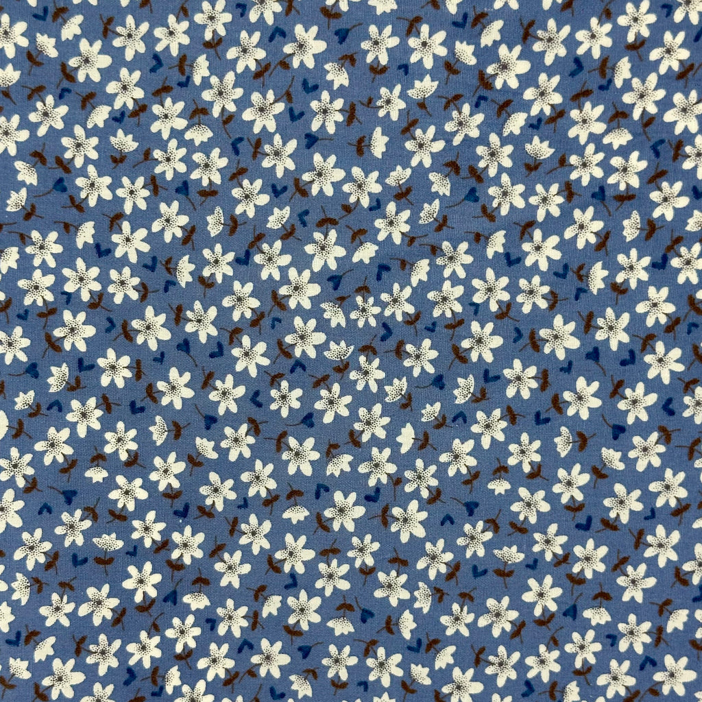 Popeline imprimée Liberty avec cent marguerites bleues