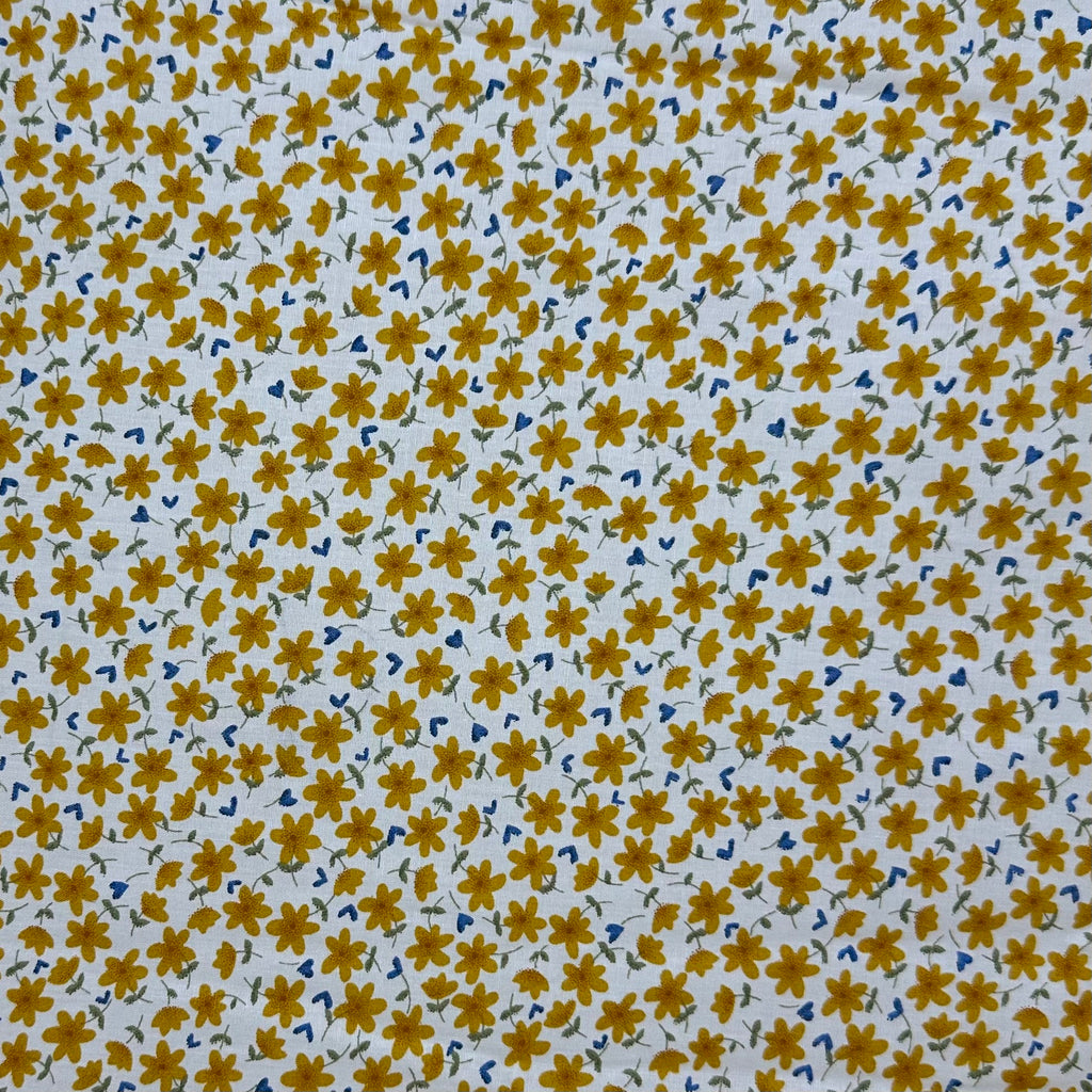 Popeline imprimée Liberty avec cent marguerites jaunes