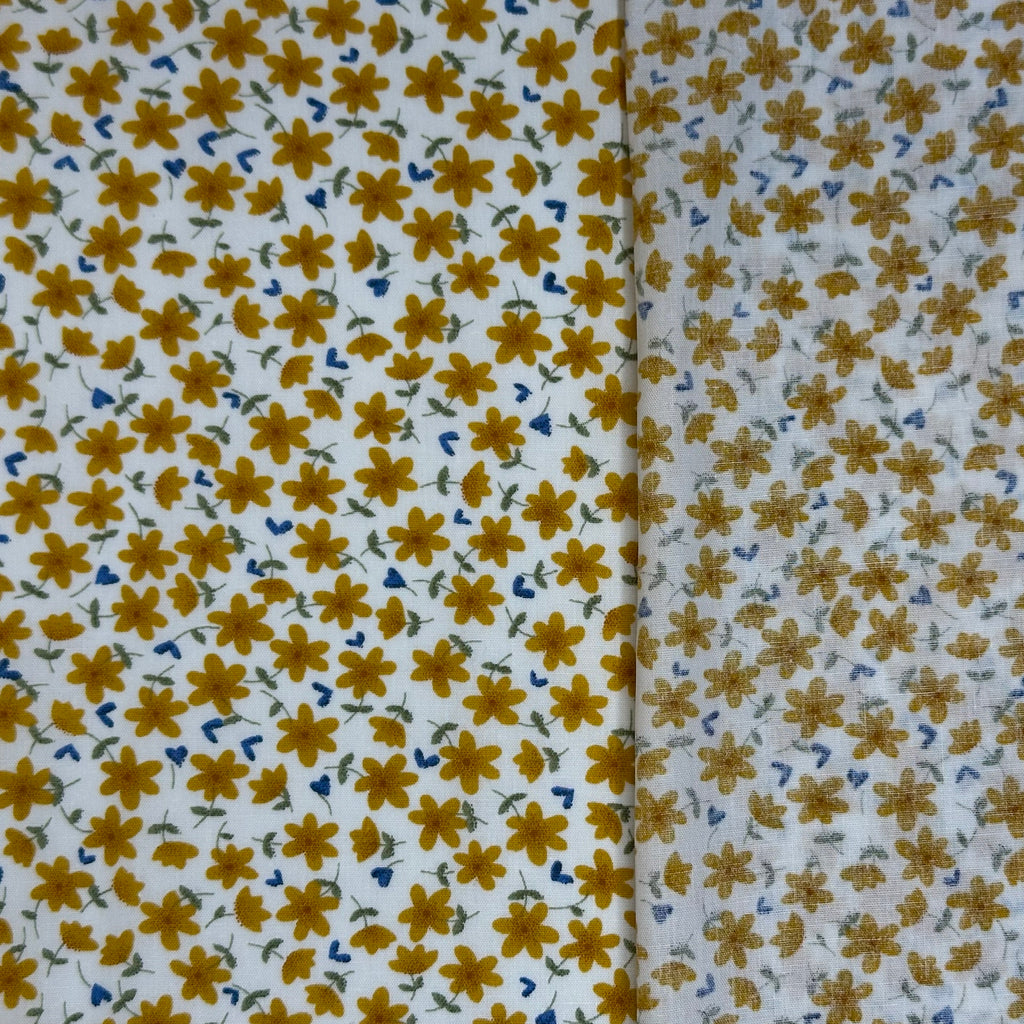 Popeline imprimée Liberty avec cent marguerites jaunes