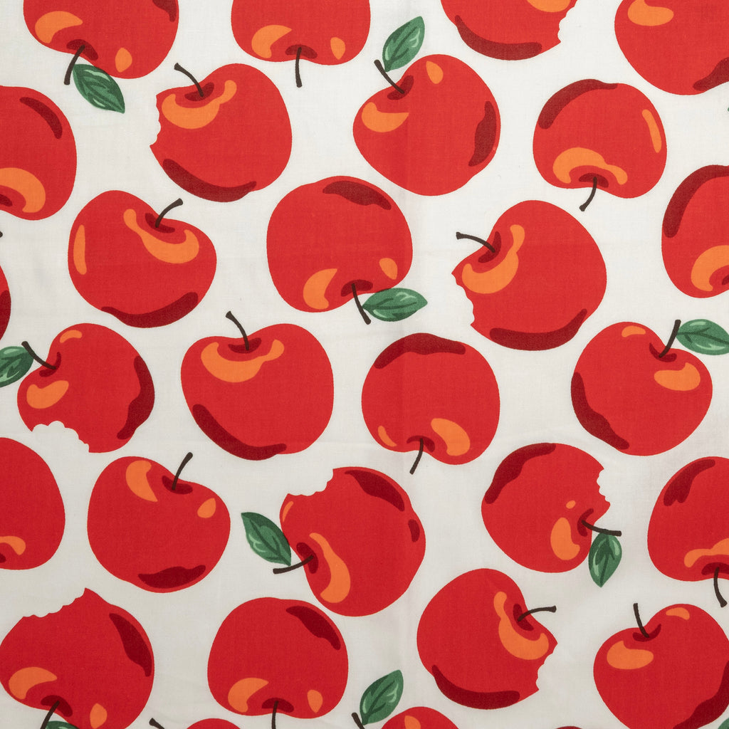 Popeline imprimée pour enfants avec des pommes rouges
