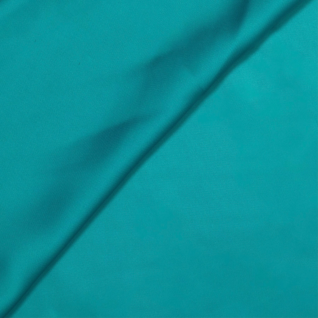 TISSU DE ROBE EN SATIN BLEU TURQUOISE